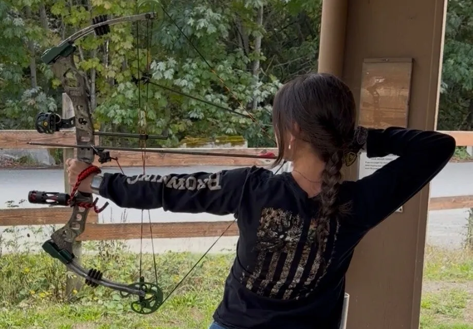 Archer at full draw on an outdoor range near Sultan, Washington